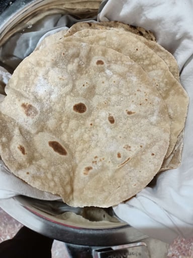 Tasty Tawa Rotis cooked by COOX chefs cooks during occasions parties events at home