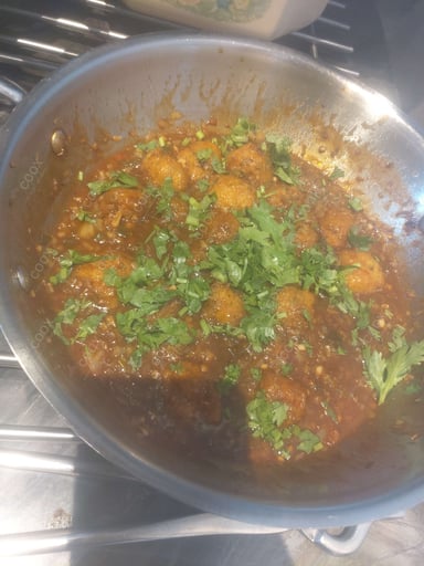 Delicious Veg Manchurian (Dry) prepared by COOX