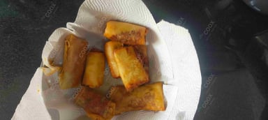 Delicious Veg Spring Rolls prepared by COOX