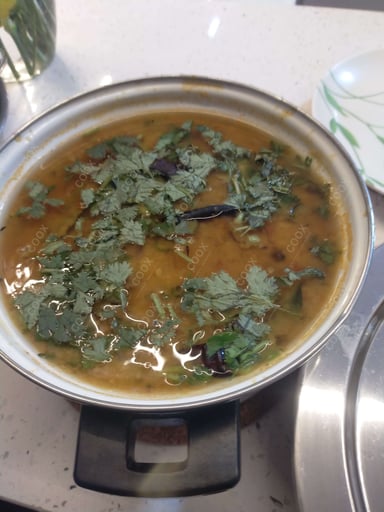 Delicious Dal Tadka prepared by COOX