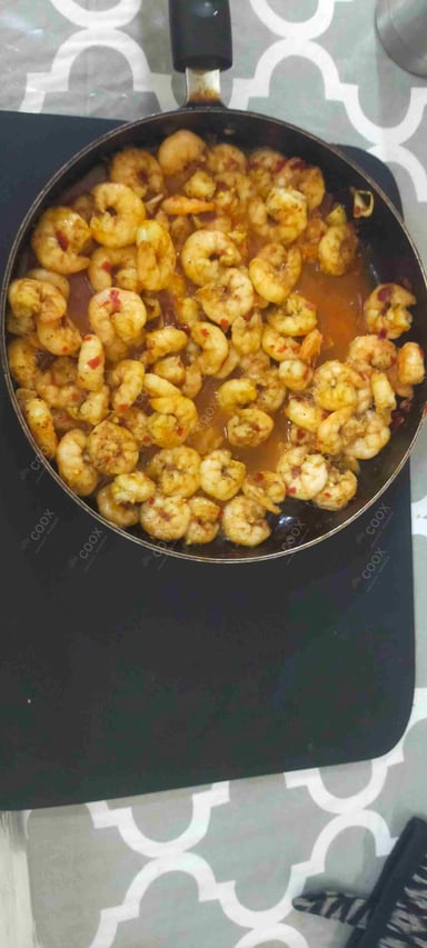 Delicious Butter Garlic Prawns prepared by COOX