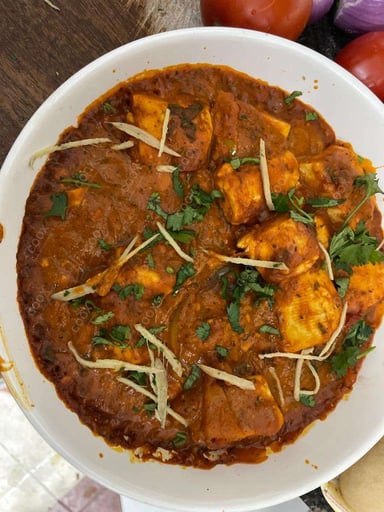 Delicious Kadhai Paneer prepared by COOX
