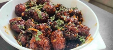 Delicious Veg Manchurian (Dry) prepared by COOX