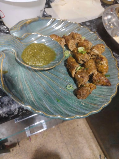 Delicious Mutton Seekh Kebab prepared by COOX