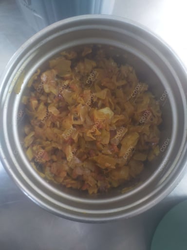 Delicious Aloo Patta Gobhi prepared by COOX