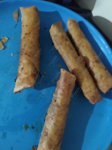 Delicious Veg Spring Rolls prepared by COOX