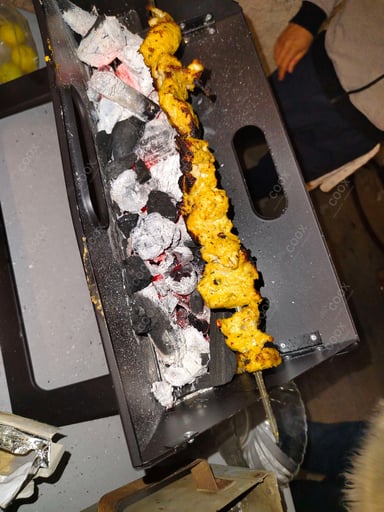 Delicious Fish Tikka prepared by COOX