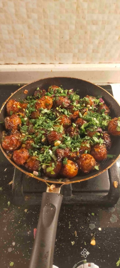 Delicious Veg Manchurian (Dry) prepared by COOX