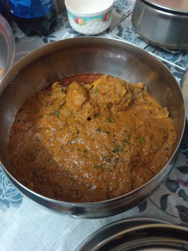 Tasty Chicken Korma cooked by COOX chefs cooks during occasions parties events at home