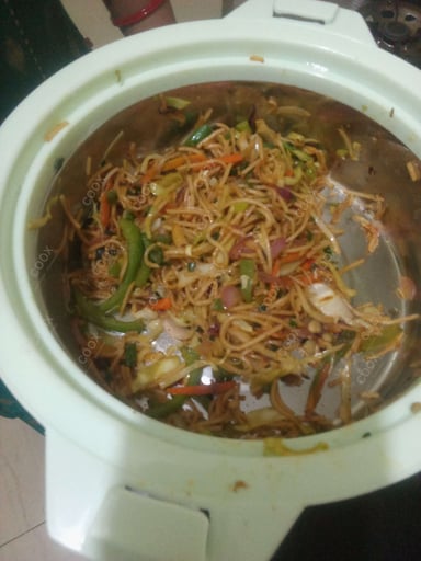 Delicious Veg Hakka Noodles prepared by COOX