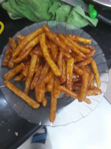 Delicious Honey Chilli Potato prepared by COOX