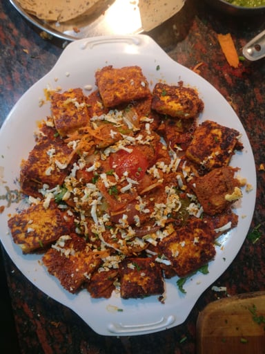 Delicious Paneer Tikka prepared by COOX