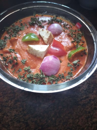 Delicious Kadhai Paneer prepared by COOX