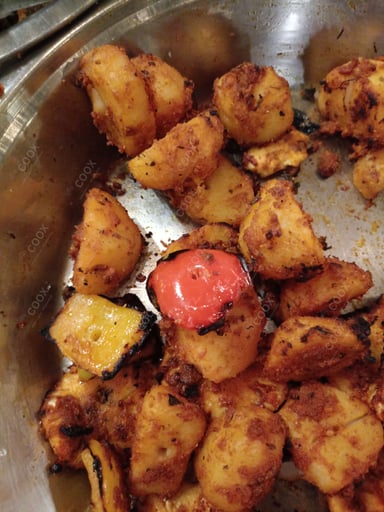 Tasty Tandoori Aloo cooked by COOX chefs cooks during occasions parties events at home