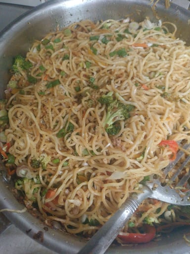 Delicious Veg Hakka Noodles prepared by COOX