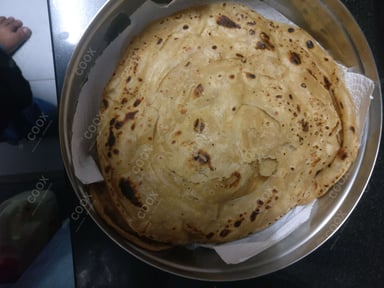 Delicious Lachha Parathas prepared by COOX