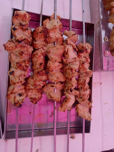 Tasty Murgh Malai Tikka cooked by COOX chefs cooks during occasions parties events at home