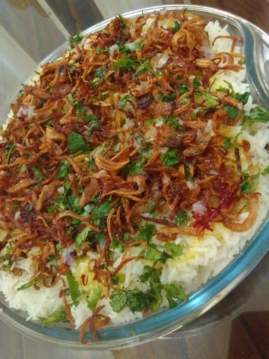 Delicious Veg Biryani prepared by COOX