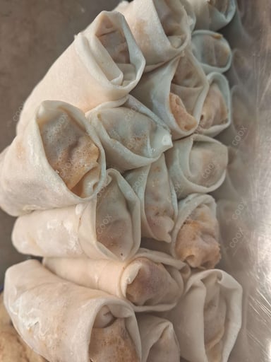 Delicious Veg Spring Rolls prepared by COOX