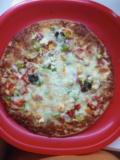 Delicious Veg Pizza prepared by COOX