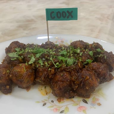 Delicious Veg Manchurian (Gravy) prepared by COOX