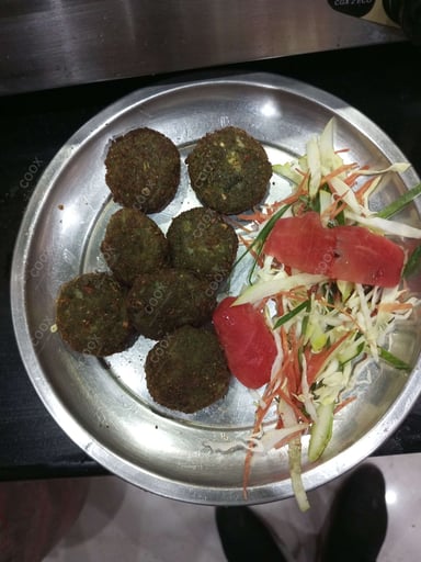 Delicious Hariyali Kebab prepared by COOX