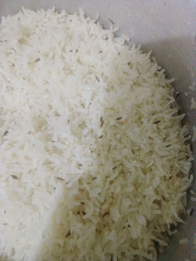 Delicious Jeera Rice prepared by COOX