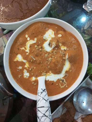 Delicious Butter Chicken prepared by COOX