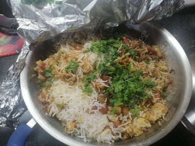 Delicious Veg Biryani prepared by COOX