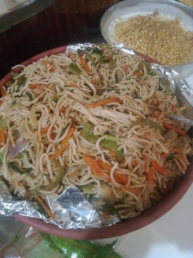 Delicious Veg Hakka Noodles prepared by COOX