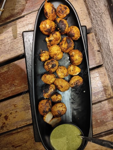 Tasty Tandoori Aloo cooked by COOX chefs cooks during occasions parties events at home