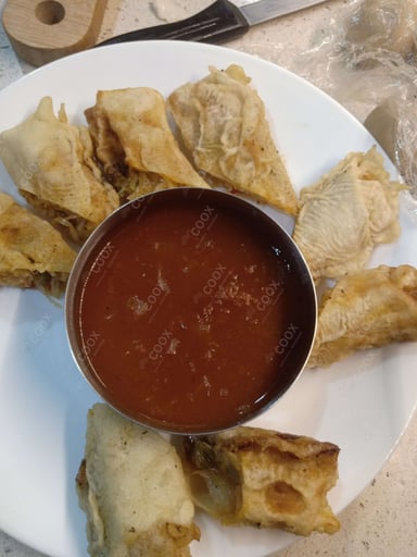 Delicious Veg Spring Rolls prepared by COOX