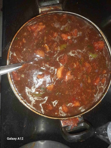 Tasty Chicken Manchurian (Gravy) cooked by COOX chefs cooks during occasions parties events at home