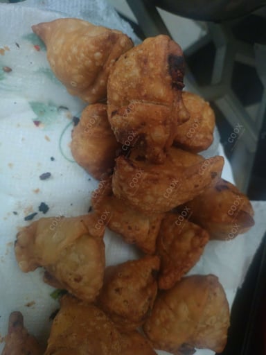 Delicious Mini Samosas prepared by COOX