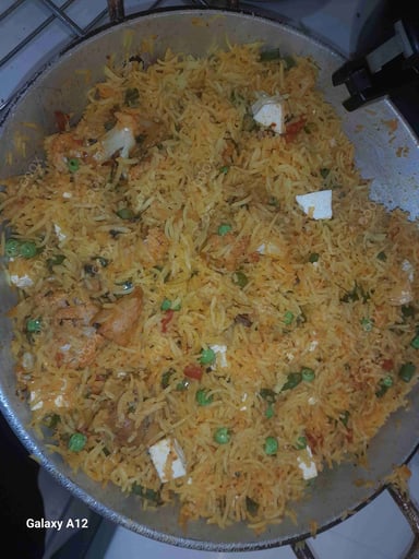 Delicious Veg Biryani prepared by COOX