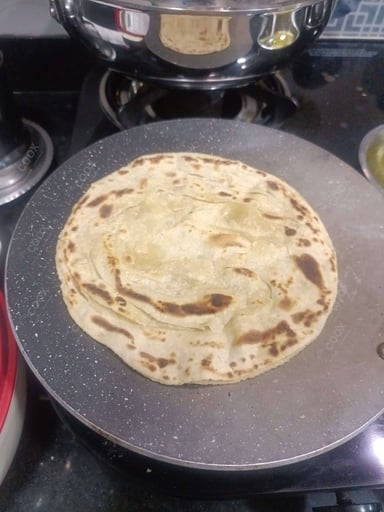 Delicious Lachha Paranthas prepared by COOX