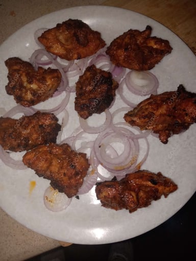 Tasty Tandoori Chicken cooked by COOX chefs cooks during occasions parties events at home