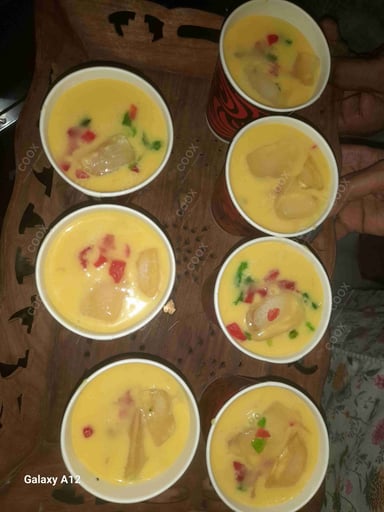 Tasty Mango Milkshake cooked by COOX chefs cooks during occasions parties events at home