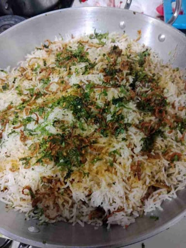 Tasty Mutton Biryani cooked by COOX chefs cooks during occasions parties events at home