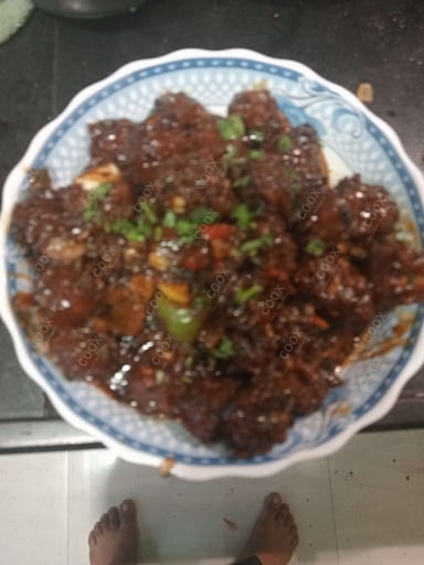 Delicious Veg Manchurian (Dry) prepared by COOX