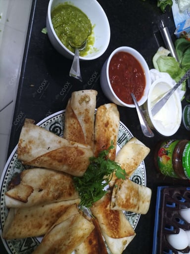 Tasty Veg Burritos cooked by COOX chefs cooks during occasions parties events at home