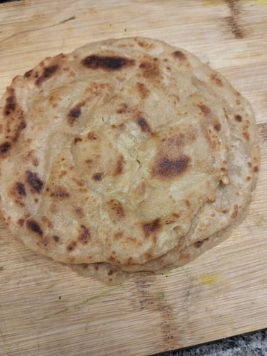 Delicious Lachha Paranthas prepared by COOX