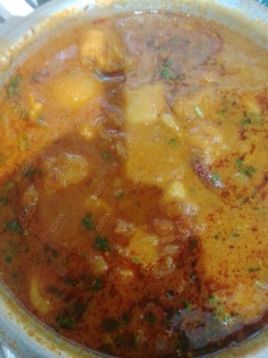 Delicious Dum Aloo prepared by COOX