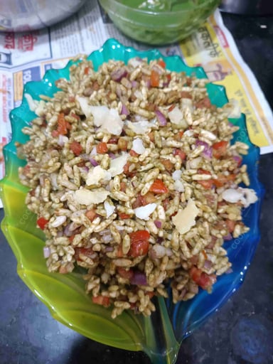 Tasty Bhel Puri cooked by COOX chefs cooks during occasions parties events at home