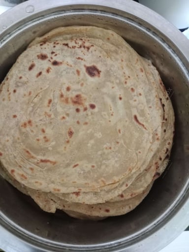 Delicious Lachha Paranthas prepared by COOX