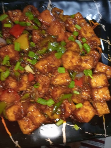 Delicious Chilli Paneer (Dry) prepared by COOX