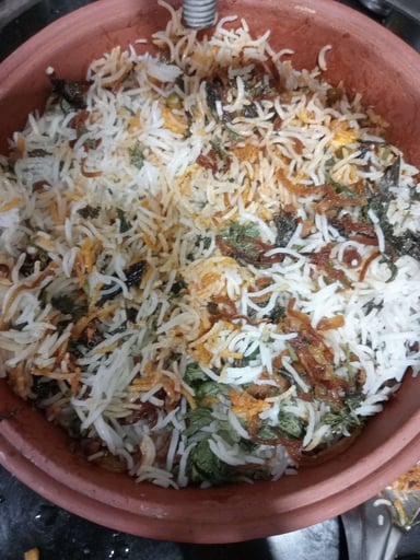 Delicious Veg Biryani prepared by COOX