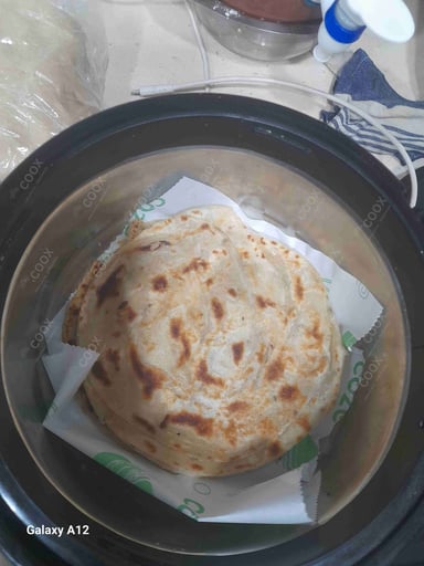 Tasty Missi Roti cooked by COOX chefs cooks during occasions parties events at home