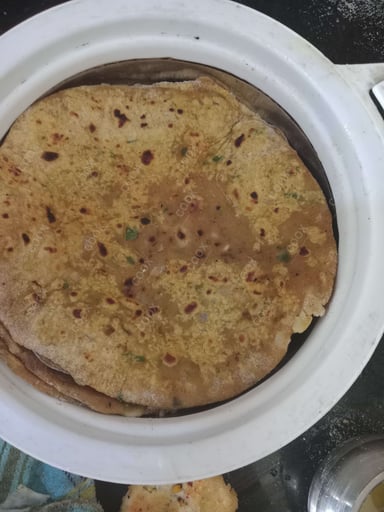 Tasty Missi Roti cooked by COOX chefs cooks during occasions parties events at home