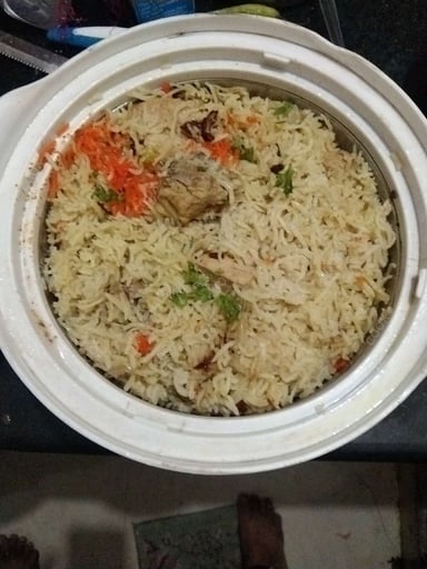 Delicious Chicken Biryani prepared by COOX